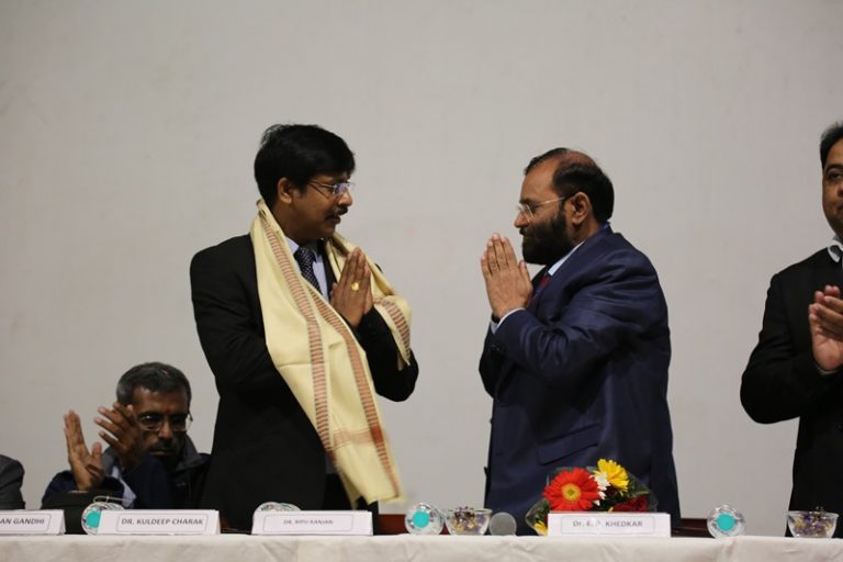 Prof. Sinha Felicitated Dr. Khedkar at Pune